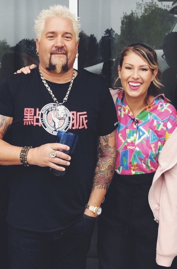 MacKenzie Smith standing with Guy Fieri