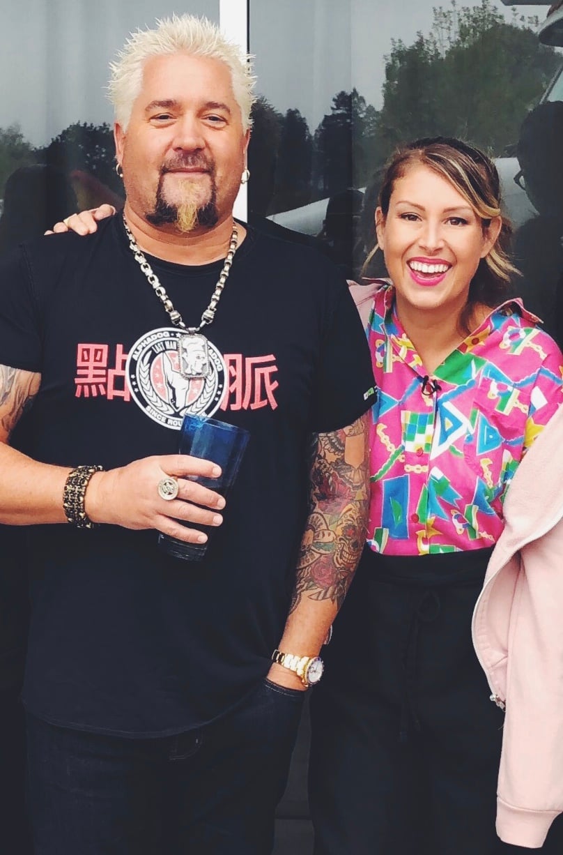 MacKenzie Smith standing with Guy Fieri