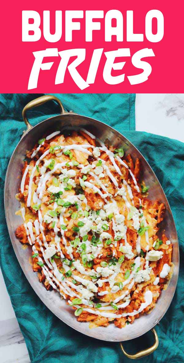 These buffalo fries are the perfect vegetarian alternative to buffalo wings! Extra crispy waffle fries are tossed with buffalo sauce and baked with cheddar cheese. Then they’re topped with crumbled blue cheese, a drizzle of ranch dressing and chopped scallions. They’re easy to make and out of this world delicious! #buffalo #appetizer #easyapp #fries #gameday #partyfood