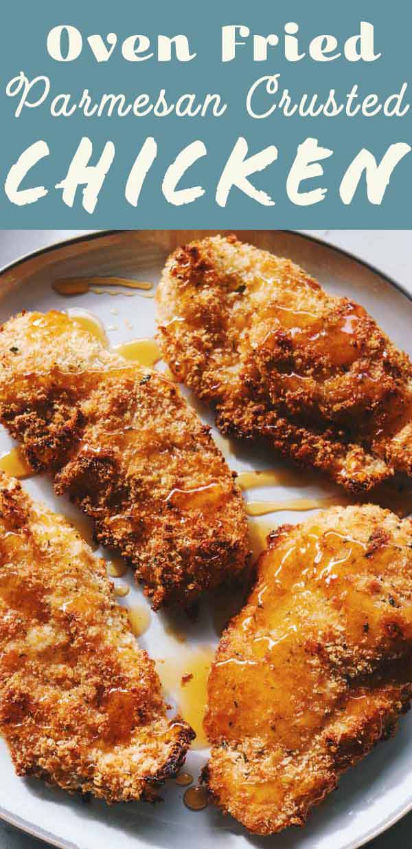 This oven fried parmesan crusted chicken is ridiculously delicious! Crispy panko, cheesy parmesan and moist buttermilk brined chicken breasts come together perfectly in this oven baked fried chicken recipe! Trust me when I say that you'll keep this easy chicken recipe on constant rotation after trying it! 
