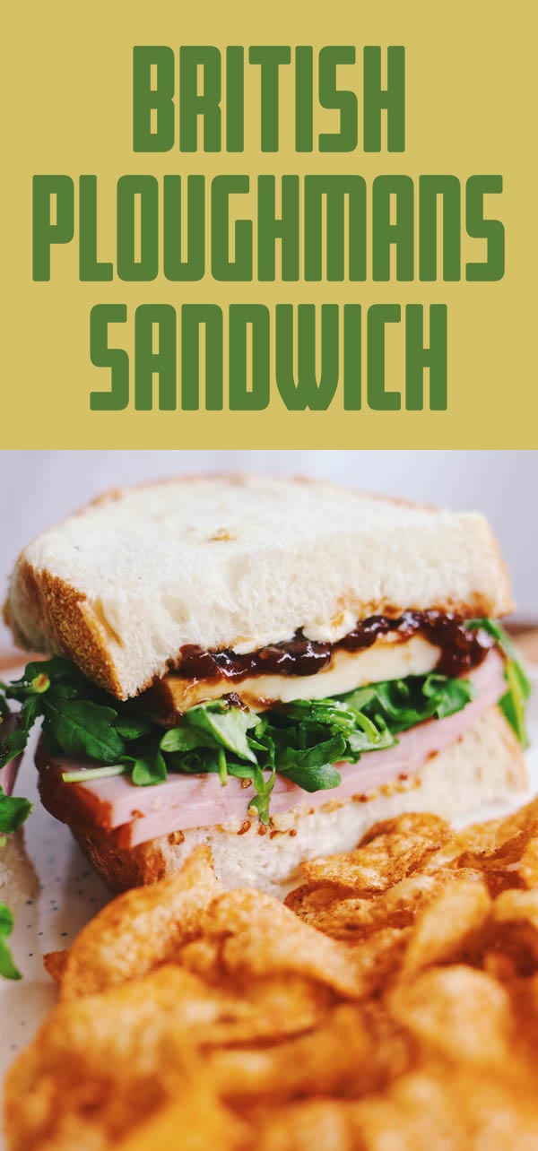 This Ploughmans Sandwich is inspired by the classic British meat and cheese platter. It's loaded with thick cut ham, aged cheddar, branston pickle, salty butter, mustard and arugula between two slices of fluffy white bread. It's a hearty lunch that's packed full of sweet and savory flavors!