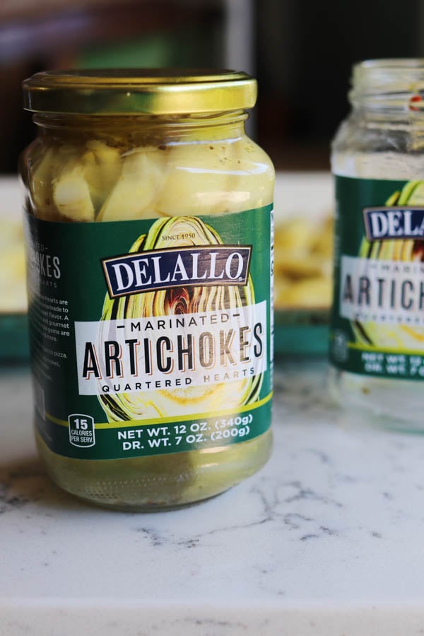 a jar of delallo marinated artichoke hearts