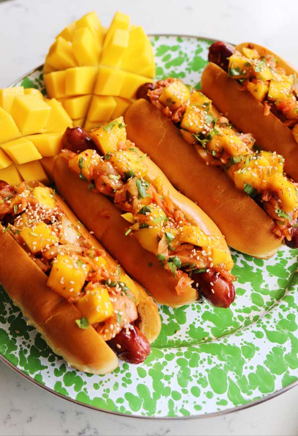 Hot Dogs with Cucumber-Mango Slaw and Homemade Srirachup