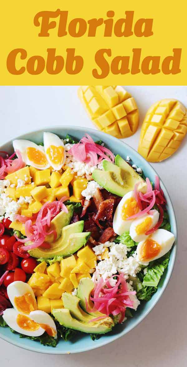  This Florida Cobb Salad is loaded with a ton of tropical southern goodness! Its got fresh mango, crispy bacon, creamy avocado, pickled red onions, tomato and feta cheese! I use my fav go-to citrus salad dressing but you could use whatever you like! 