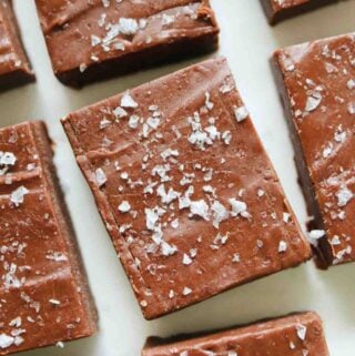 close up of nutella fudge rectangles on a white countertop.
