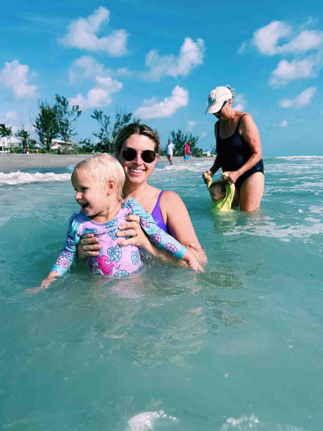 mackenzie smith and her daughter poppy swimming in captiva island.