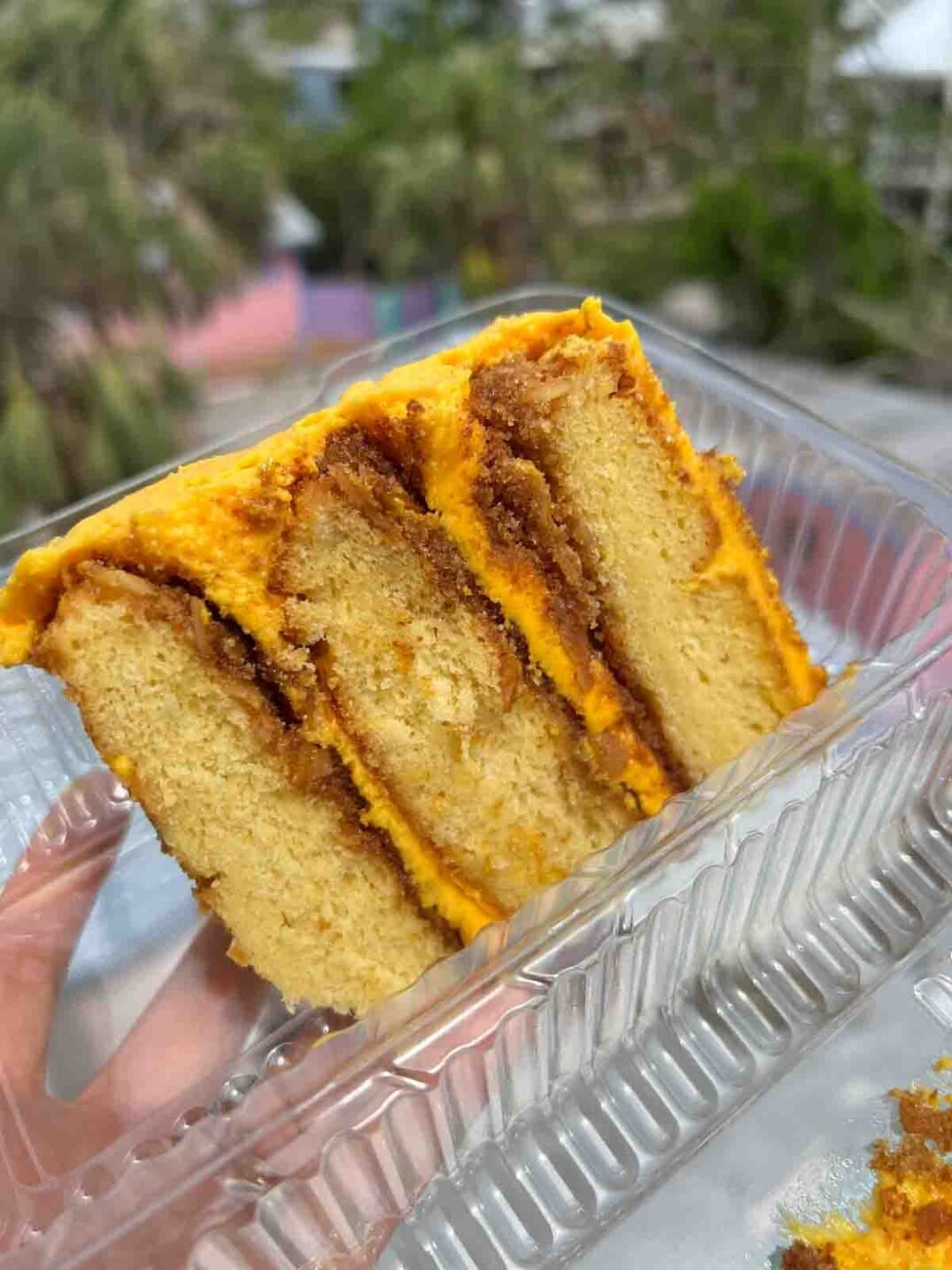 orange crunch cake in a plastic container from the bubble room in captiva island