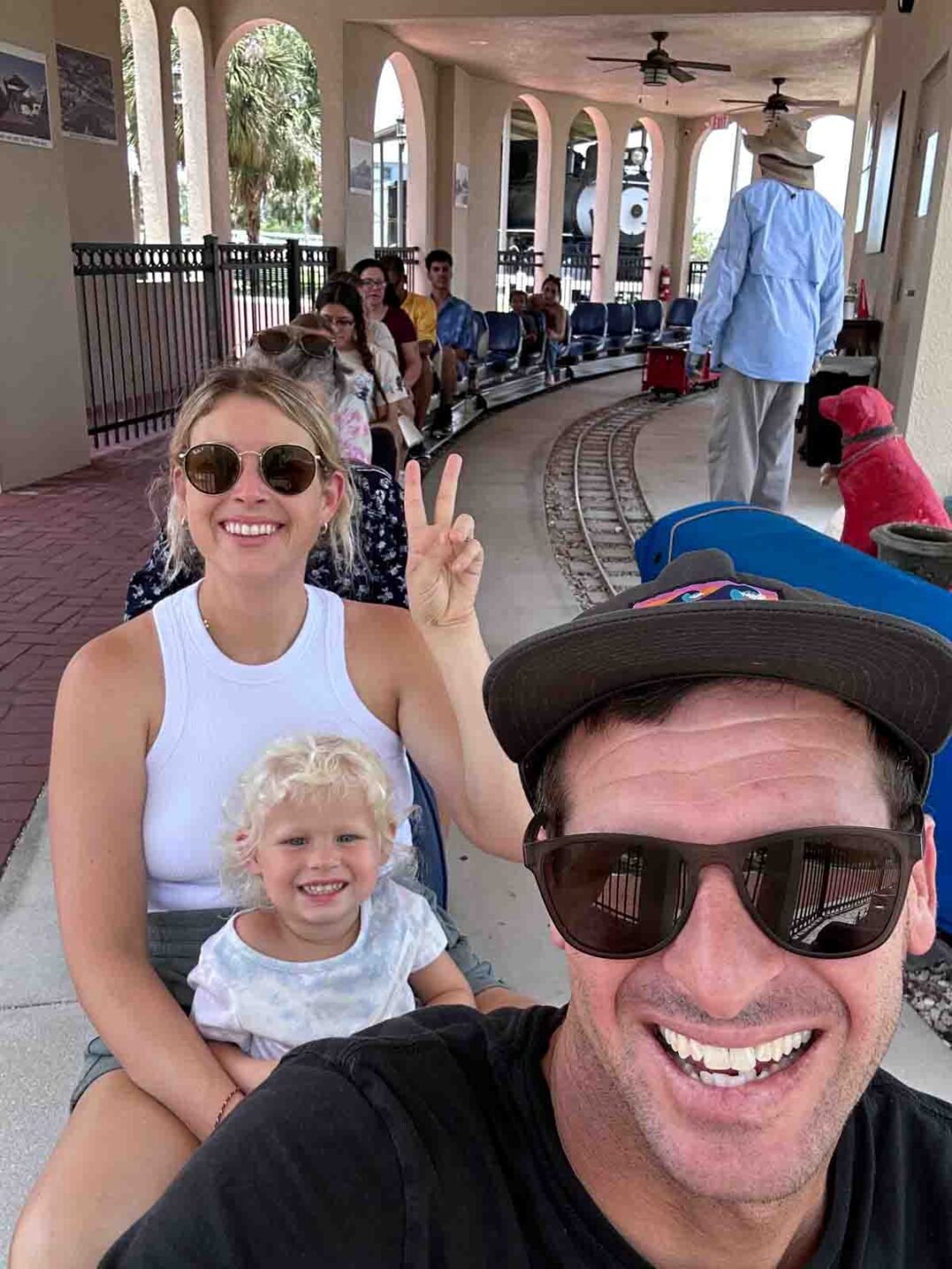 a family on the tiny train at lakes park in fort myers florida