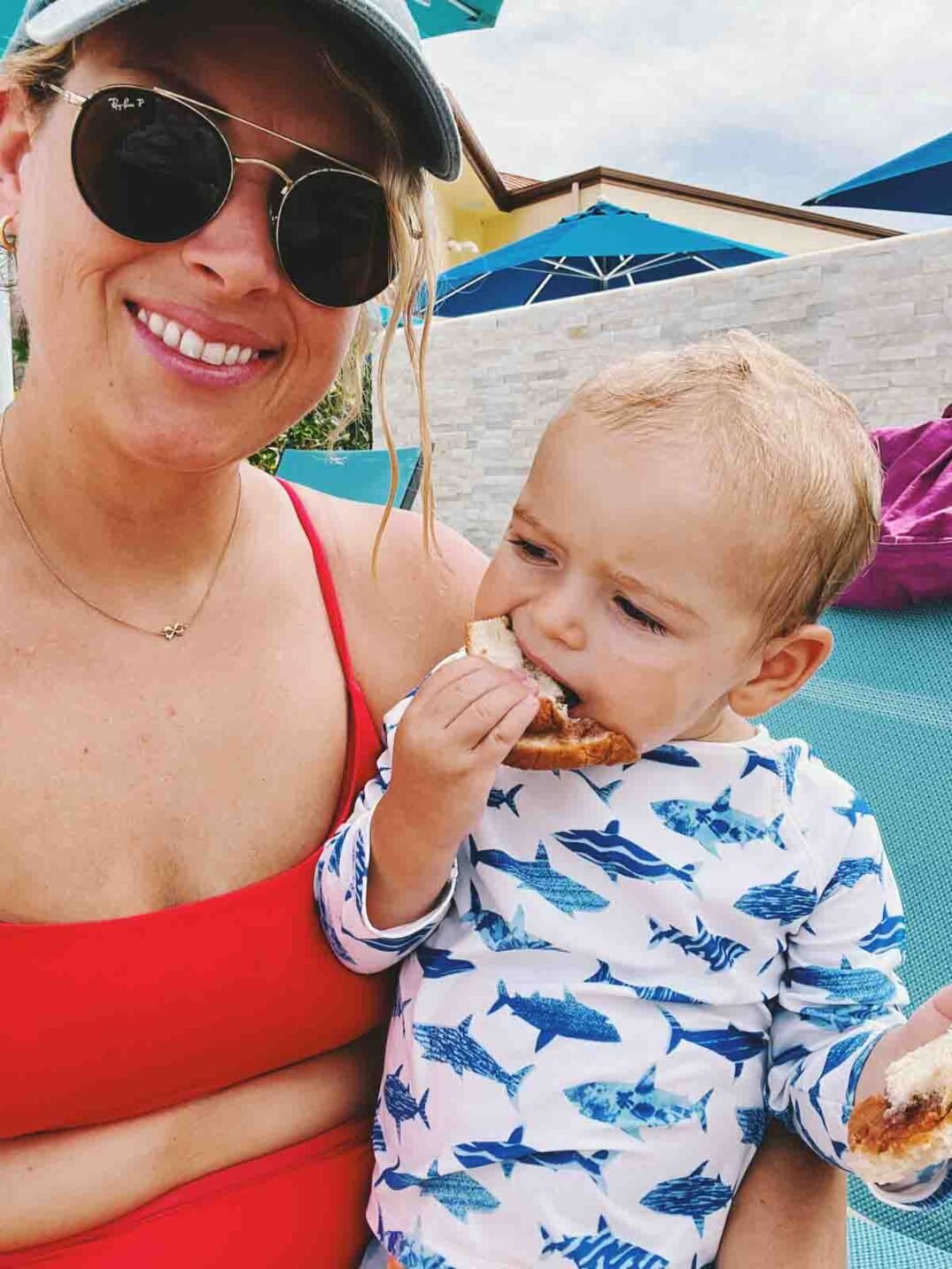 mackenzie and her son jett in bathing suits at 'tween waters in captiva after hurricane ian. 