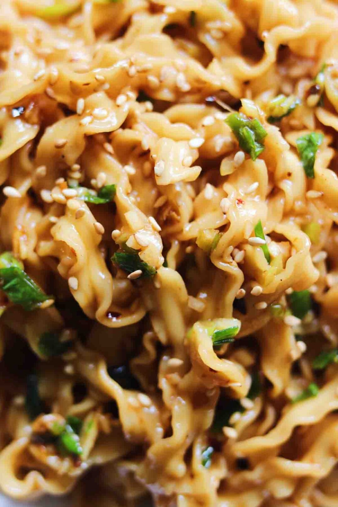 an up close view of Trader Joe's Squiggly Knife Cut Noodles with Spicy Garlic Saue.