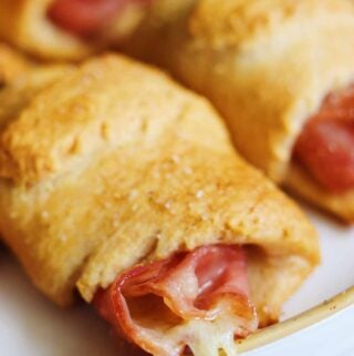 Ham and Cheese Crescent Rolls on a white plate