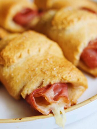 https://grilledcheesesocial.com/wp-content/uploads/2023/07/ham-cheese-crescent-rolls-grilled-cheese-social-13-340x450.jpg