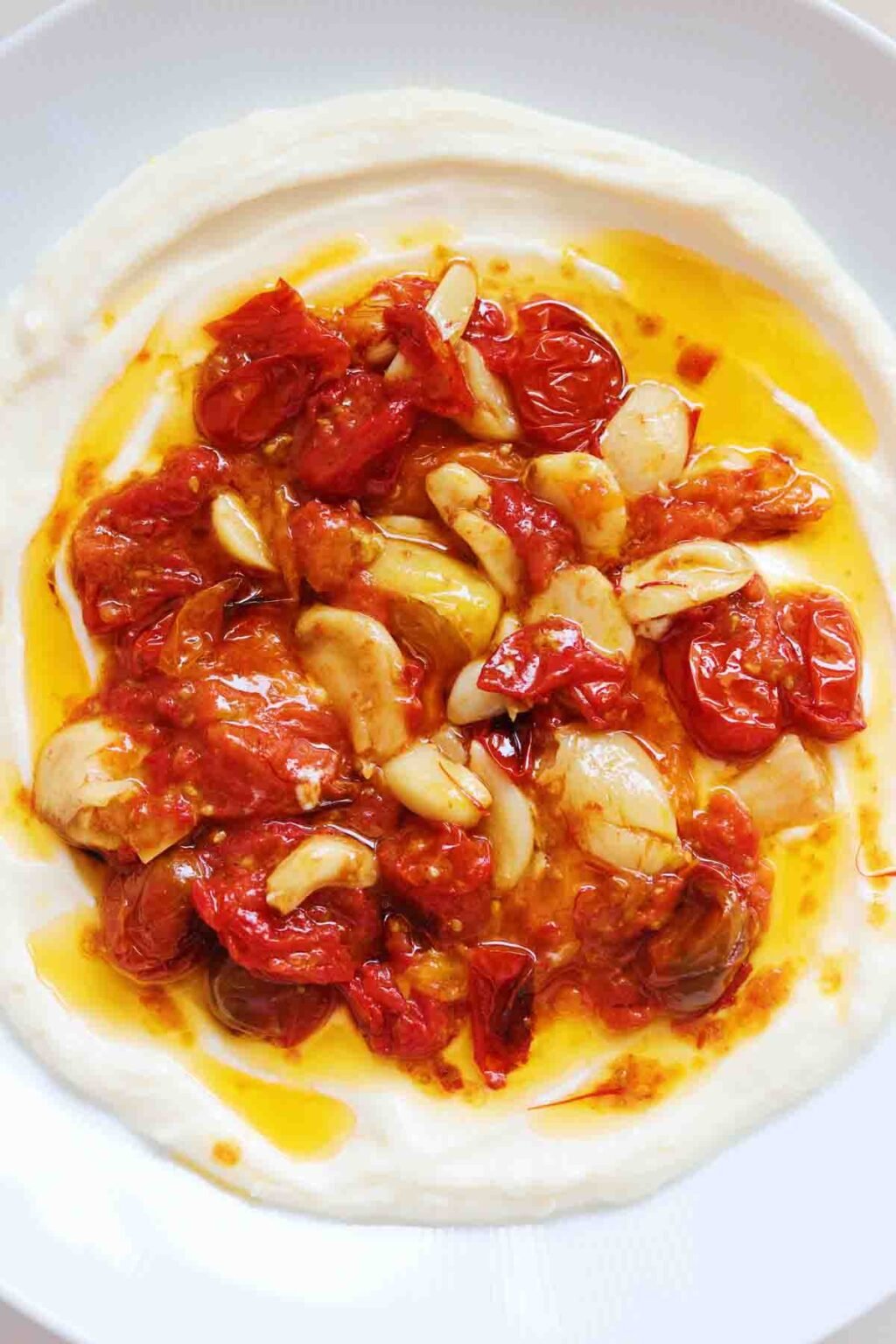 Whipped Honey Ricotta with Saffron Tomato Garlic Confit Grilled