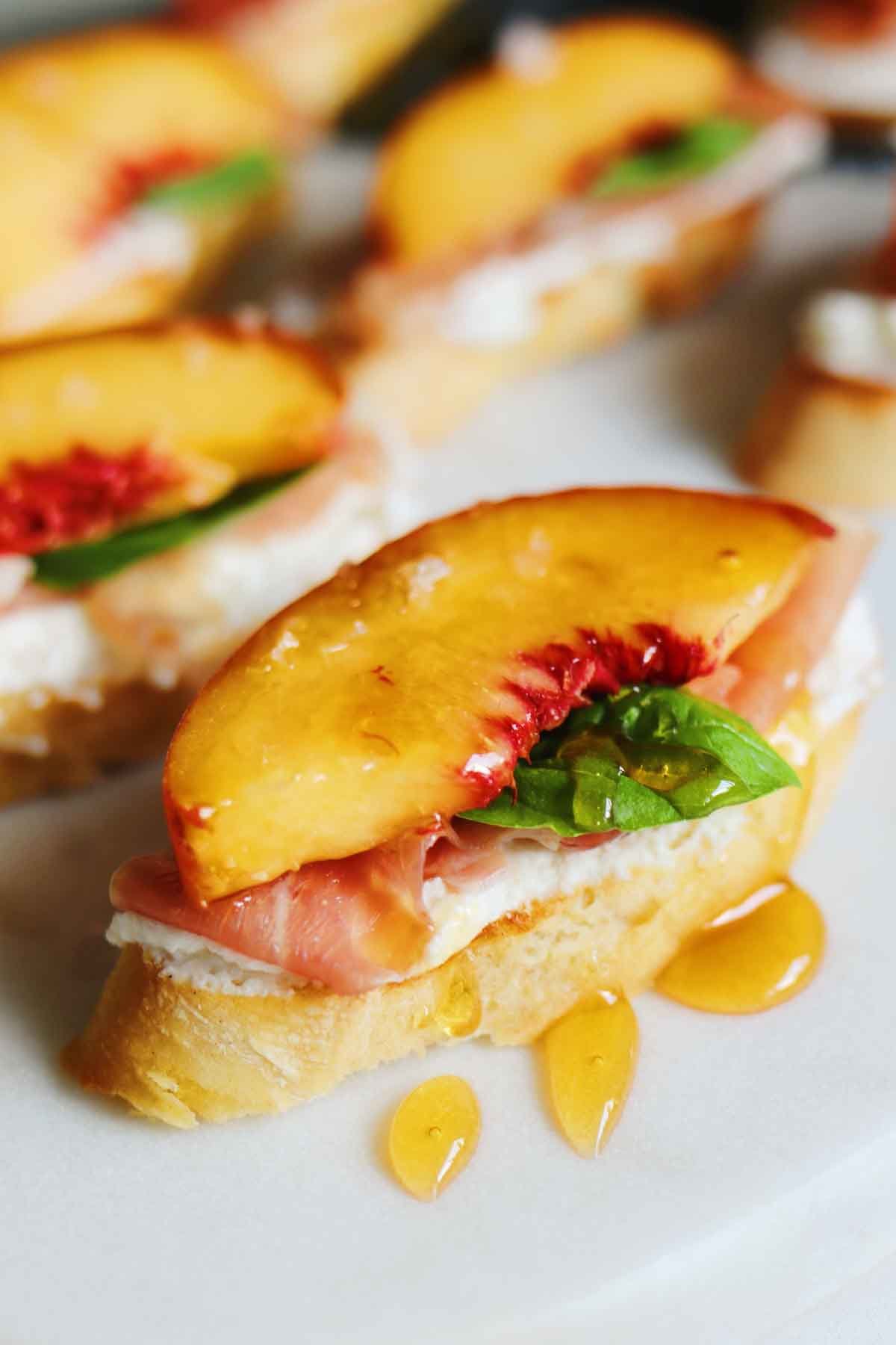 Ricotta Crostini with Hot Honey Peaches & Prosciutto Grilled Cheese