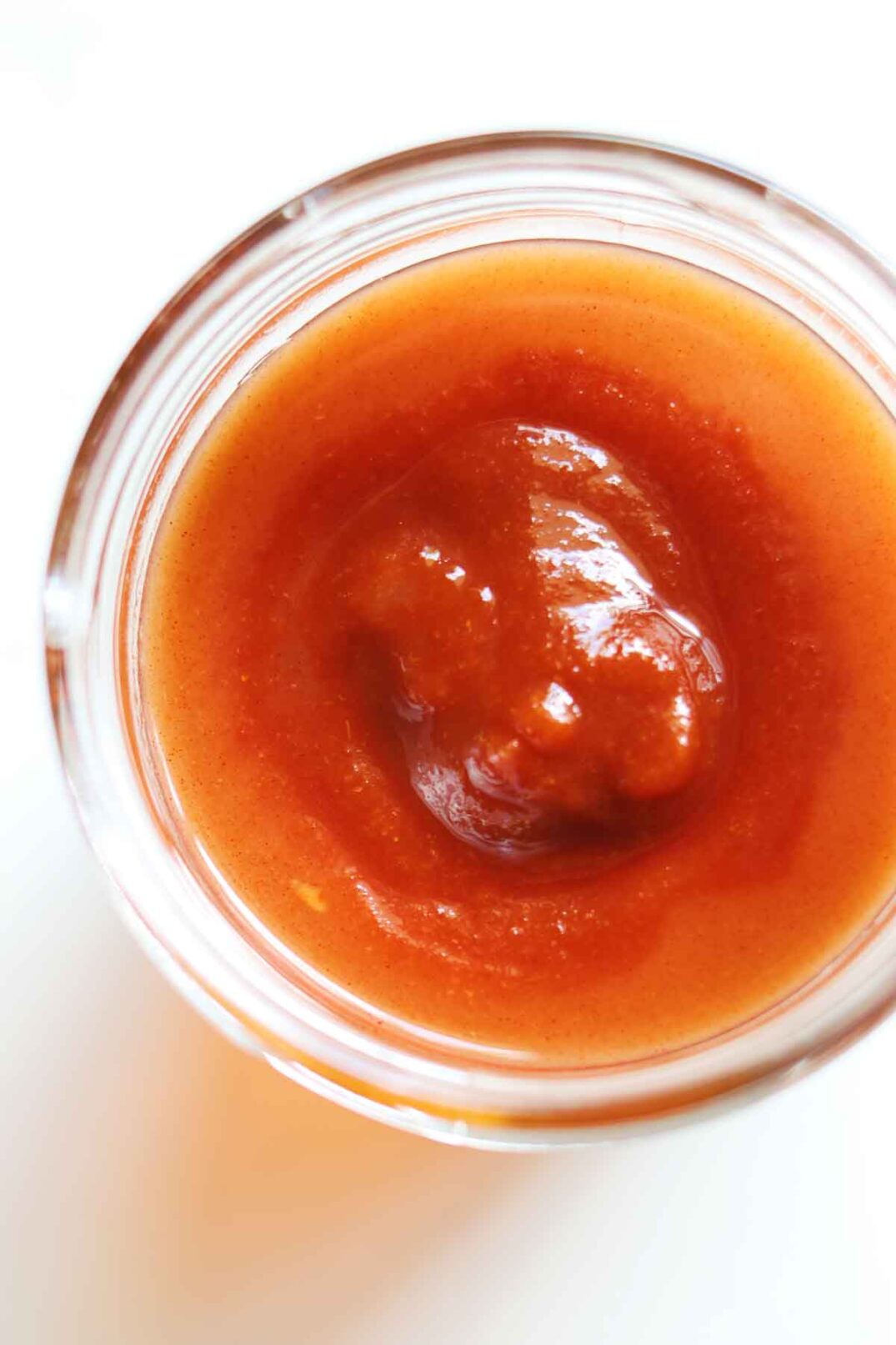 hot honey sauce ingredients in a glass jar. 