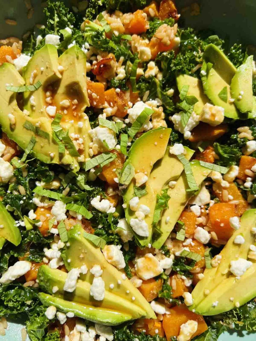 an upclose view of the ingredients in kale butternut squash salad.
