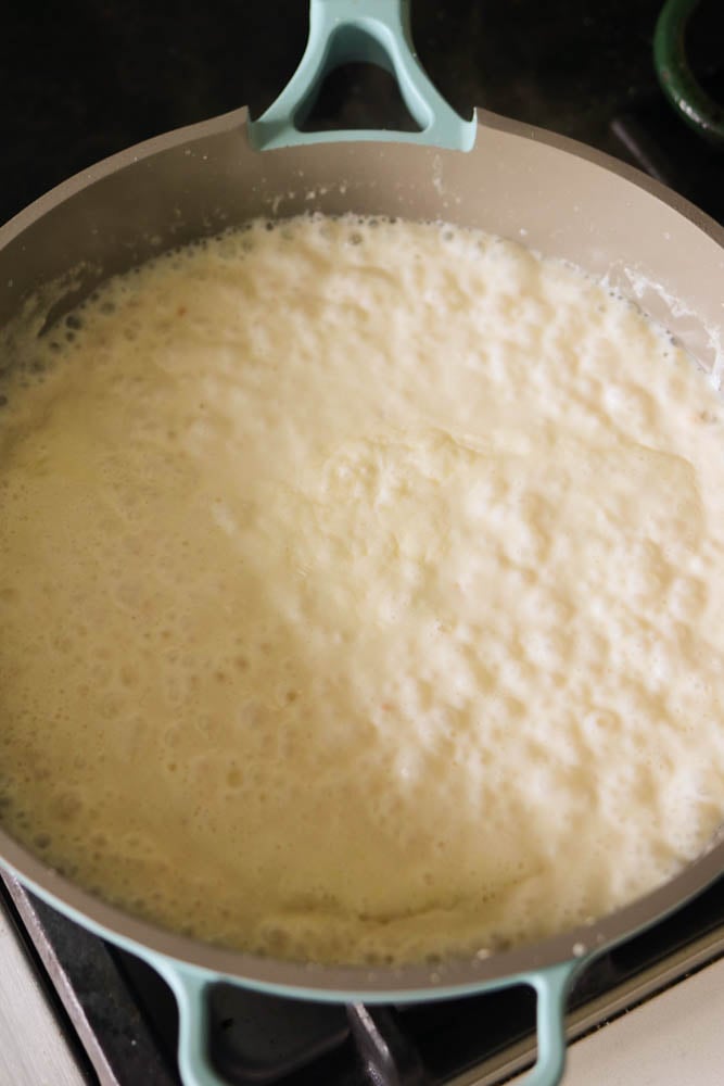 whole milk reducing down into a creamy white sauce. 