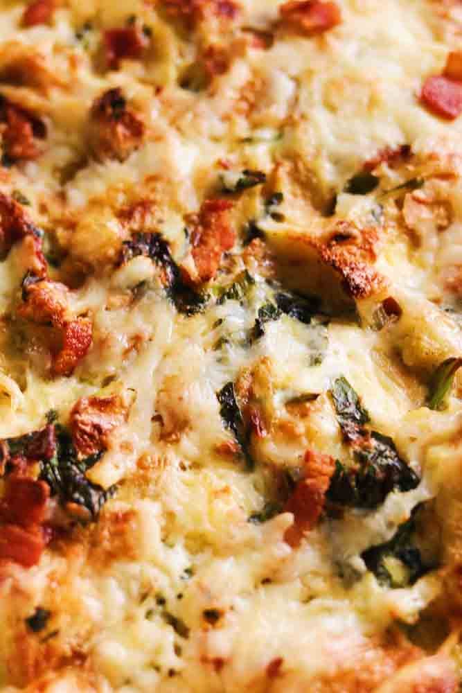 a close up of the crispy exterior of a bacon and cheese strata. 
