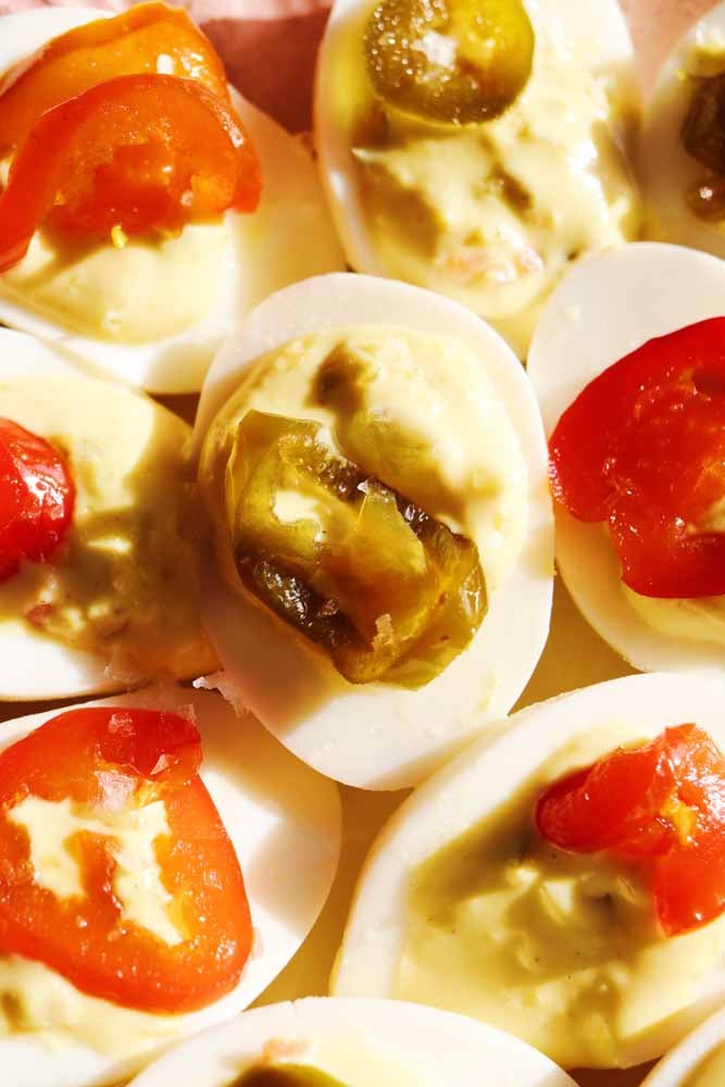 an up close view of candied jalapeno deviled eggs.