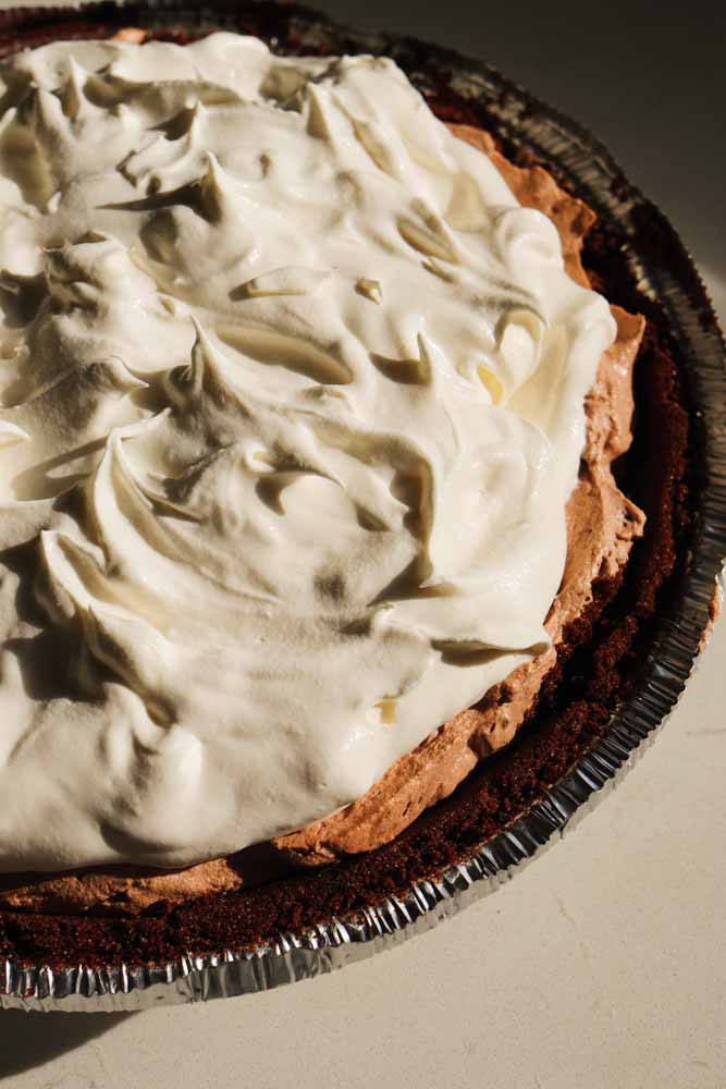 frozen hot chocolate pie with marshmallow fluff whip cream on top. 