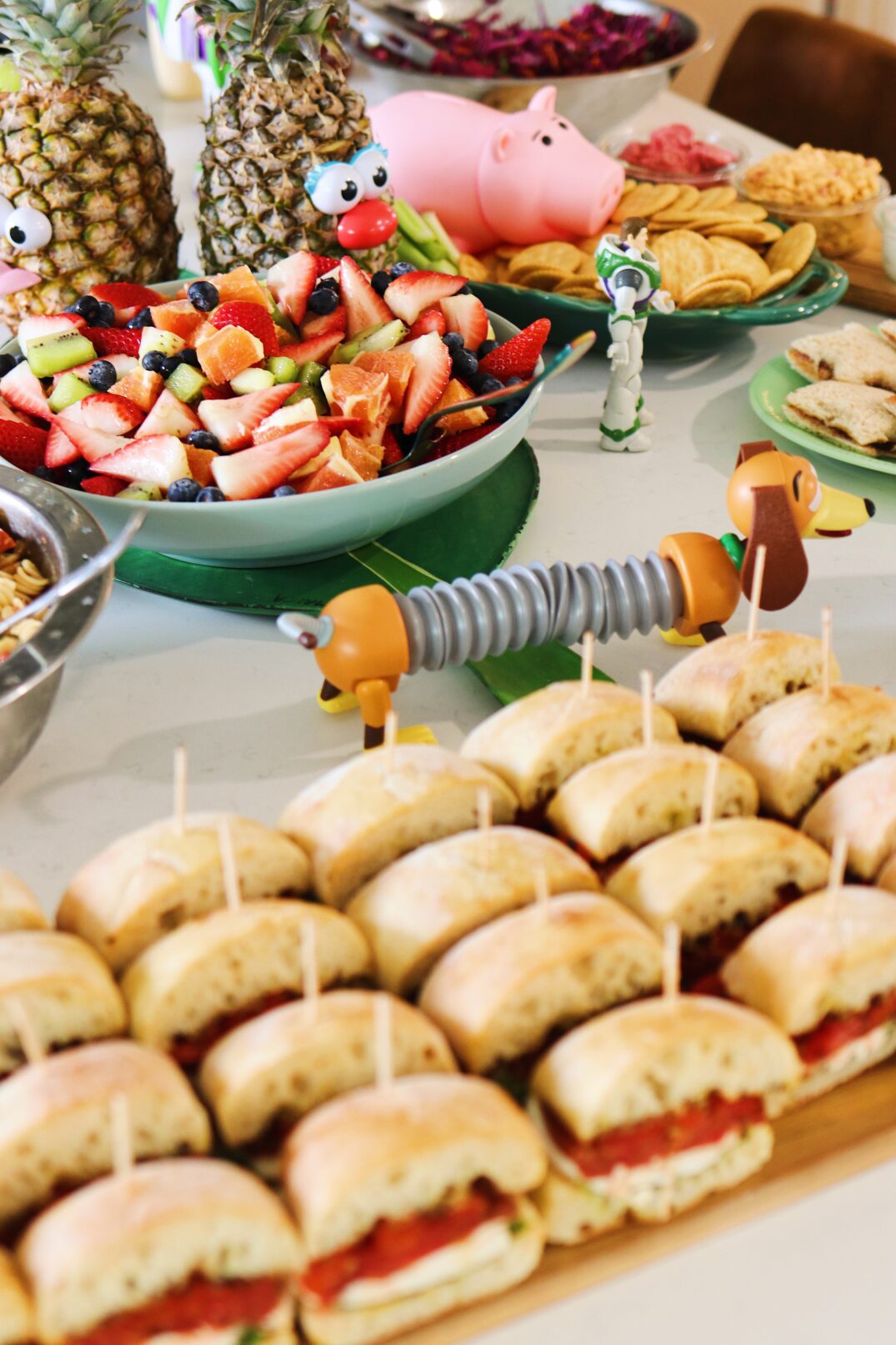 toy story party spread on a white table. 