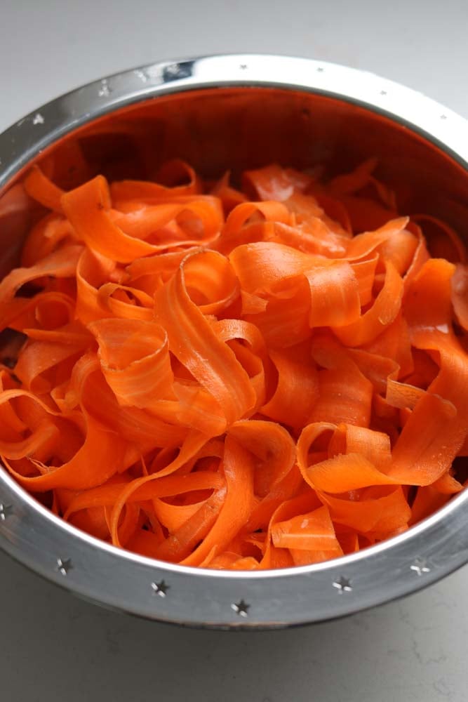 carrot ribbons in a silver bowl. 