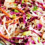 an up close look at the colorful and textural tangy coleslaw for pulled pork.