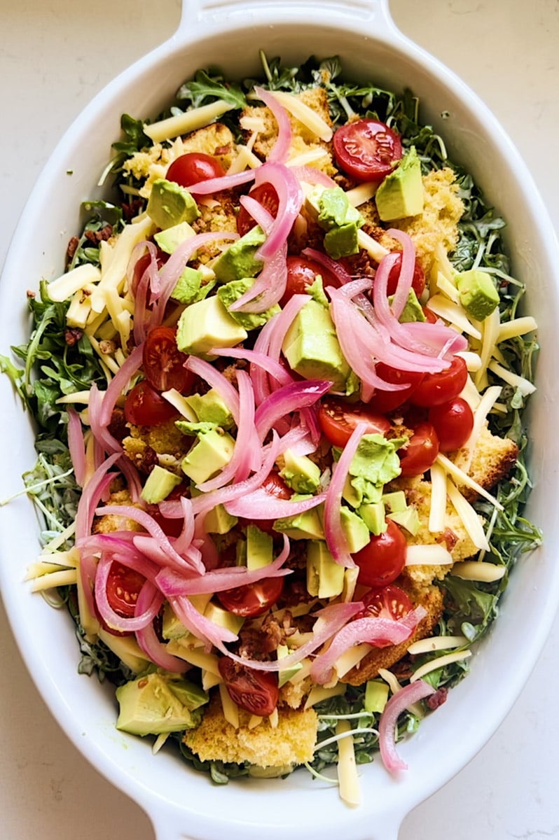 the overhead view of a large cornbread salad. 