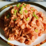 easy spicy tuna recipe in a white bowl.