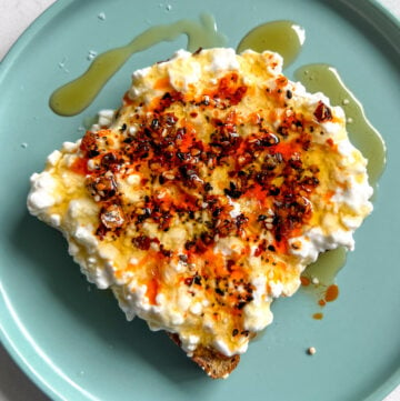 cottage cheese toast with crispy chili oil and honey on protien bread