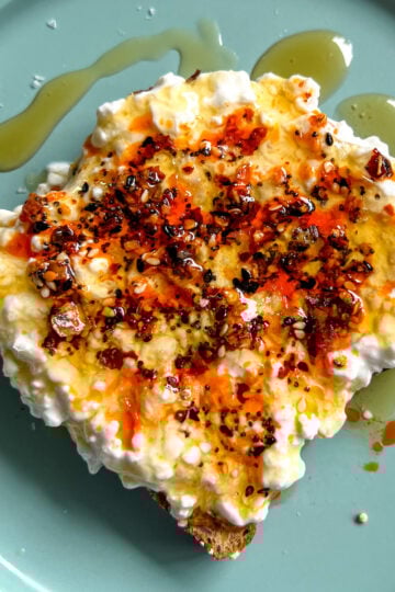 cottage cheese toast with crispy chili oil and honey on protien bread