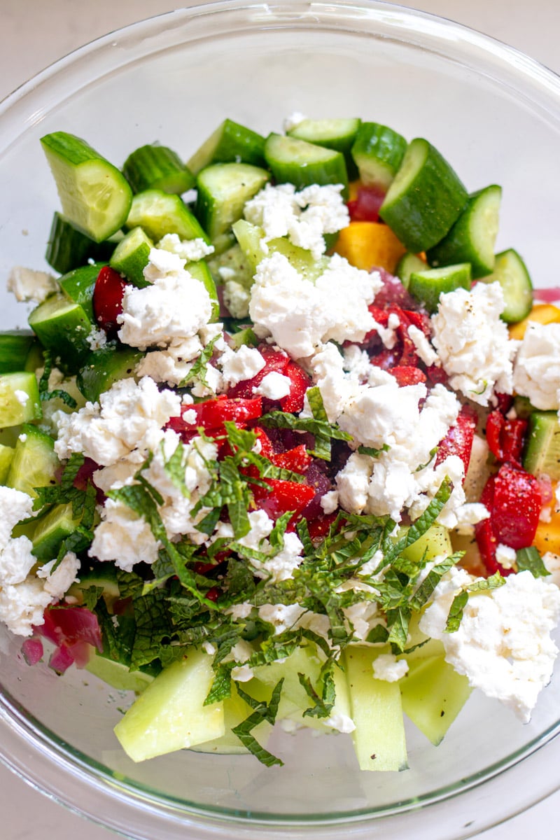 salad ingredients with feta, mint and peppadews.