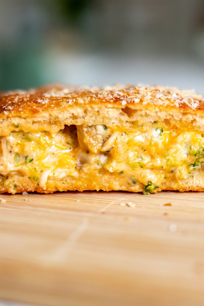 a look at the inside of a cheesy chicken and broccoli hot pocket.