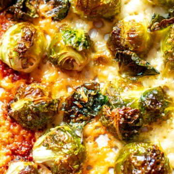 an up close view of the texture of parmesan crusted brussels sprouts.