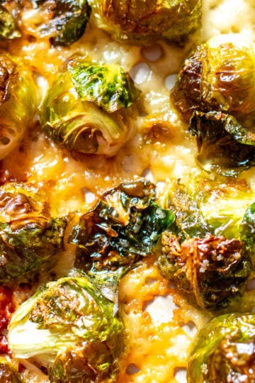 an up close view of the texture of parmesan crusted brussels sprouts.