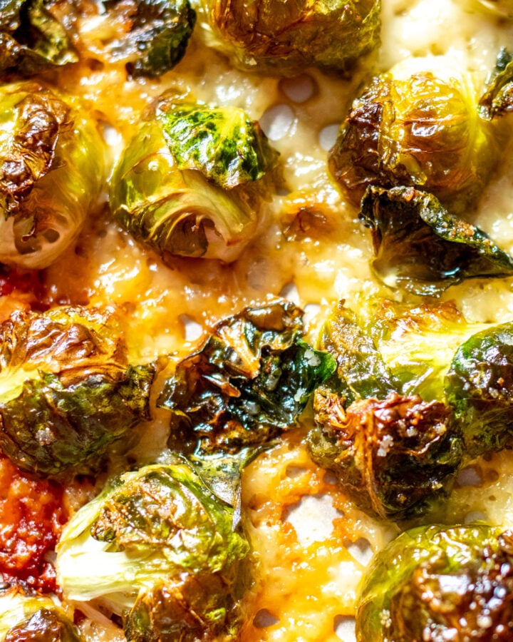 an up close view of the texture of parmesan crusted brussels sprouts.