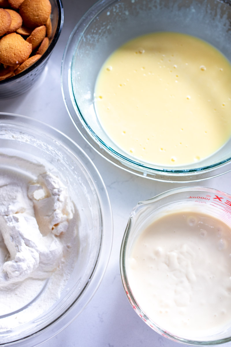 3 different bowls of deliciousness that come together to make southern banana pudding with condensed milk.