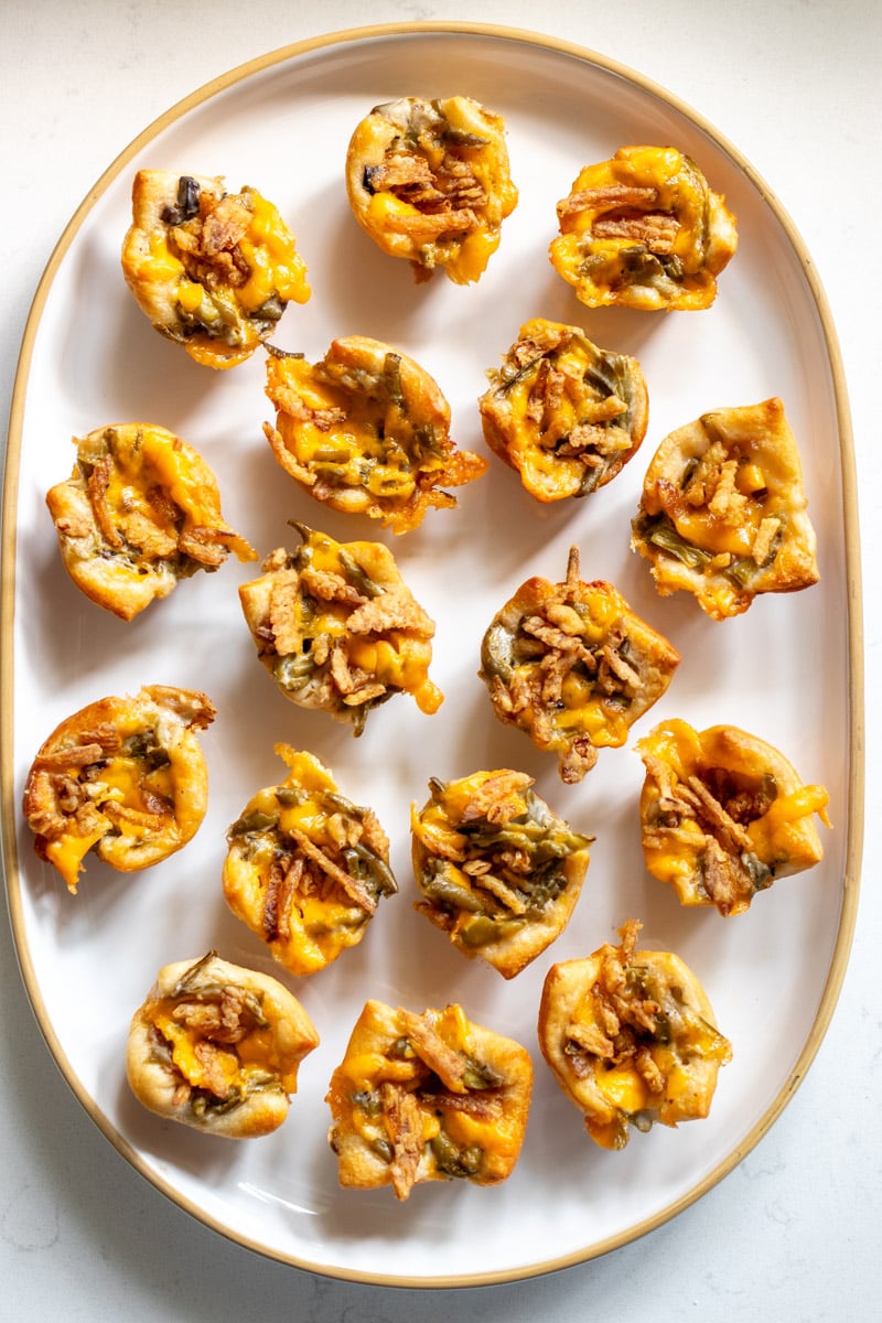 a huge platter of green bean casserole appetizers.