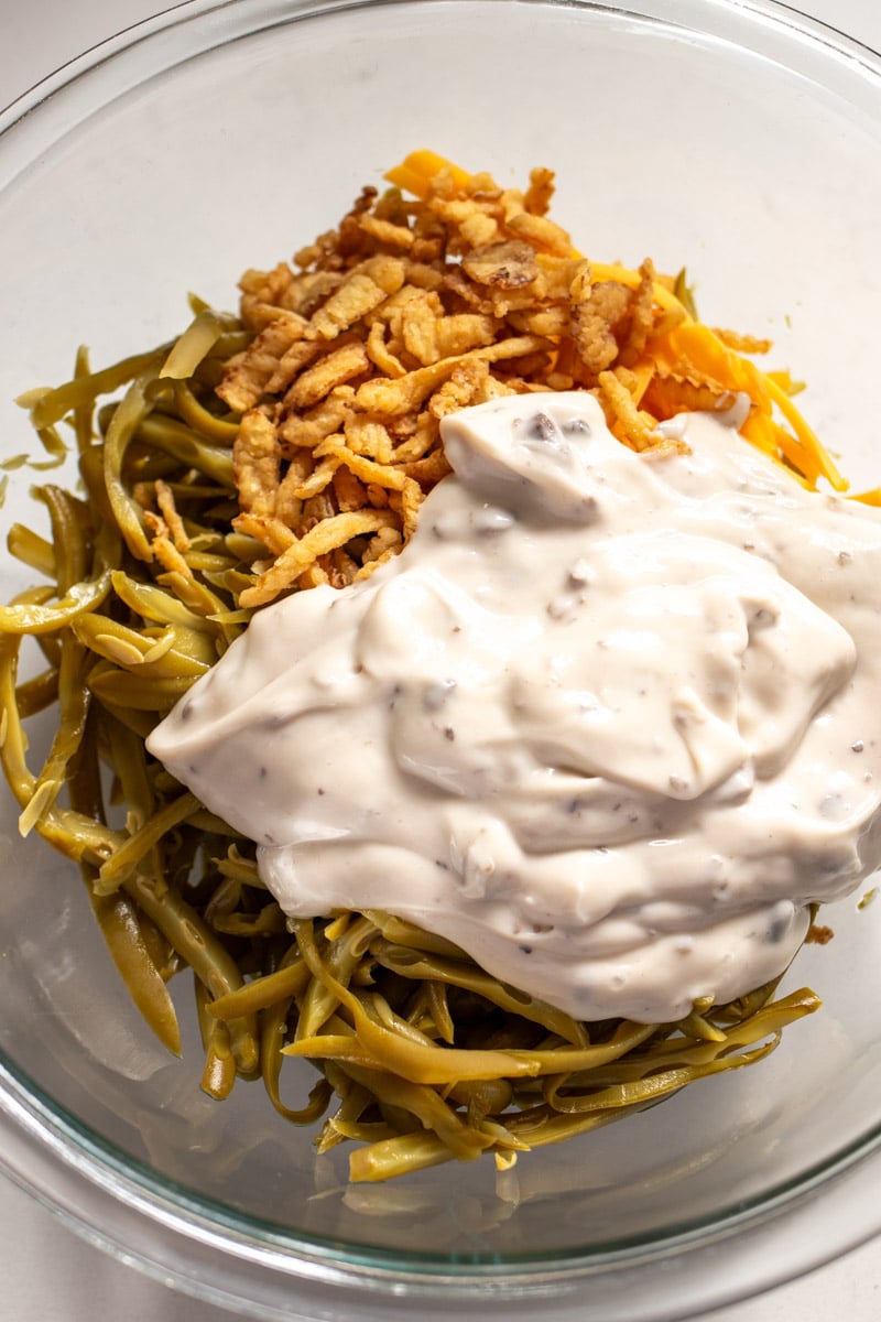 green bean casserole ingredients in a glass bow.