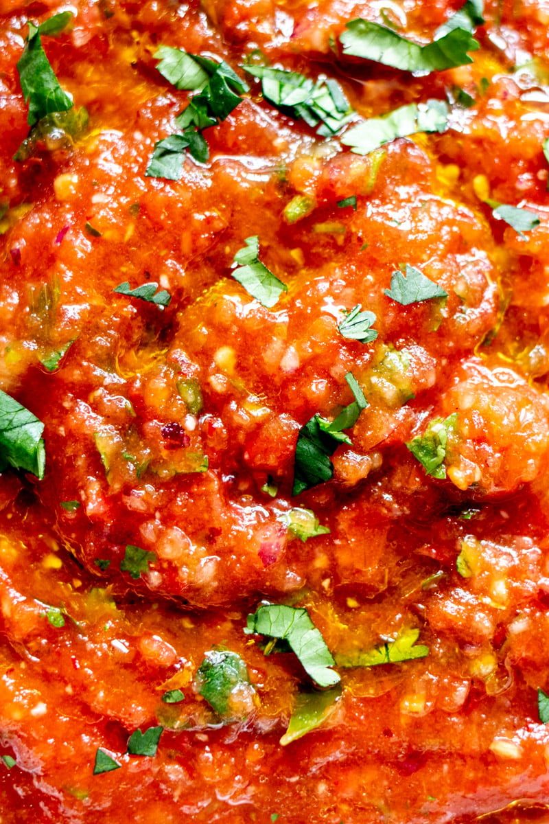 a close up of the texture of this hot salsa recipe.