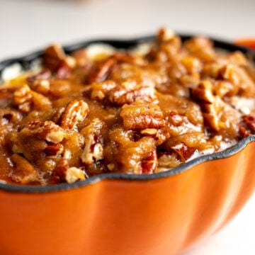 pecan pie inspired goat cheese dip in an orange pumpkin ramekin.