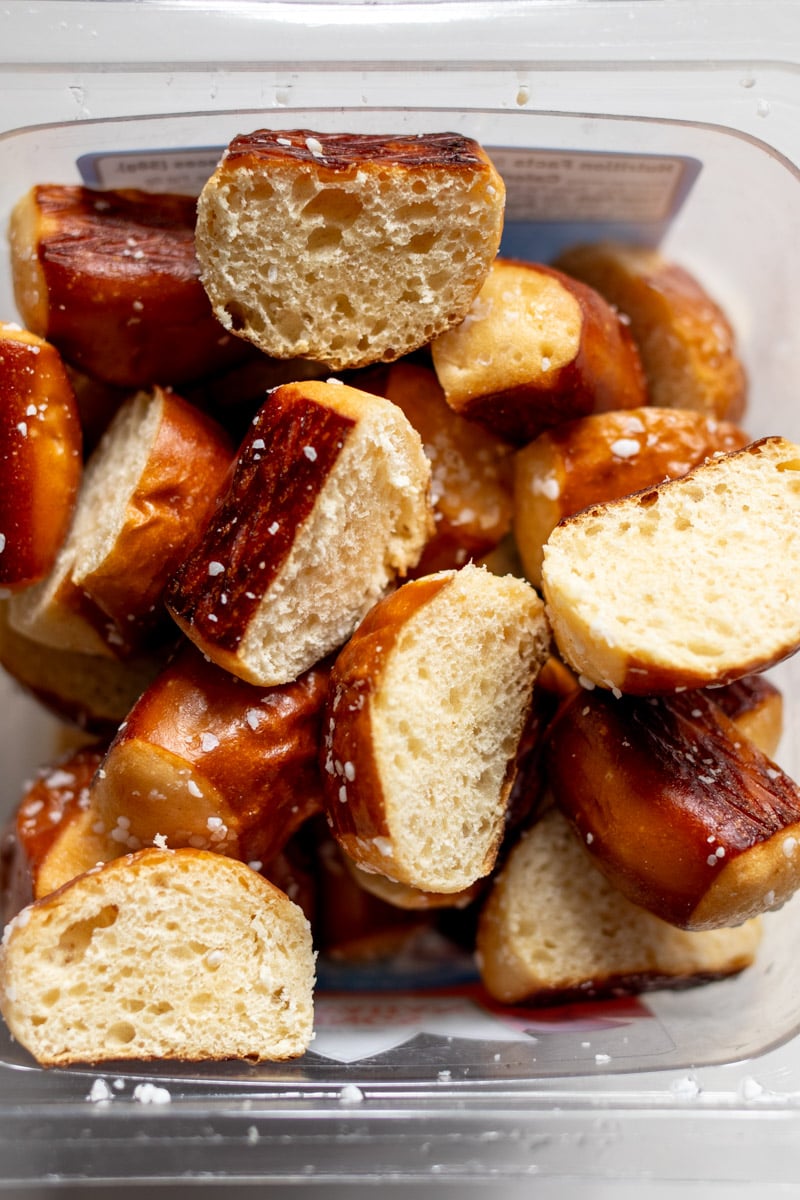 a tub of kings hawaiian pretzel bites cut up into small pieces.