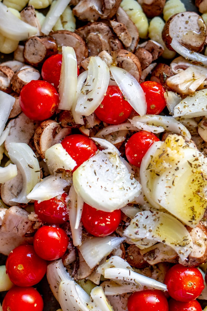 veggies on a sheet pan with olive oil and seasoning.