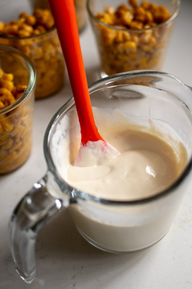 crema, mayo and lime juice in a small measuring cup.