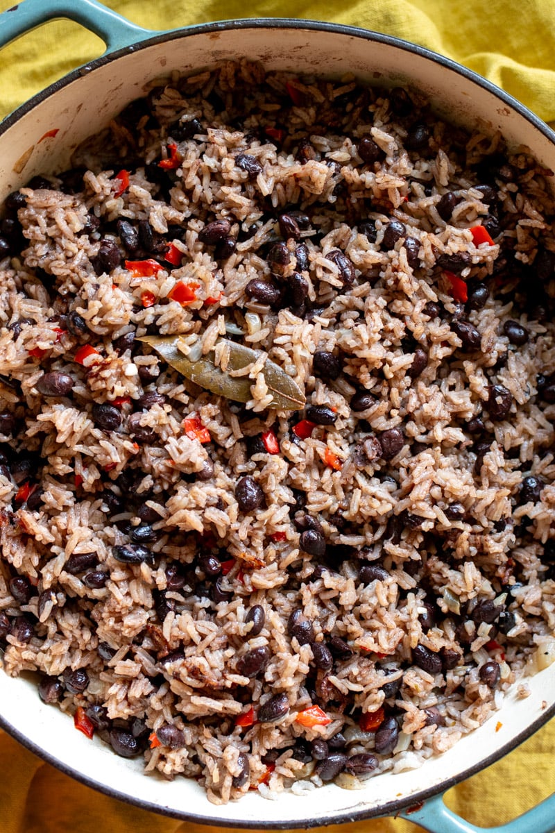 a large pot of black beans and rice.