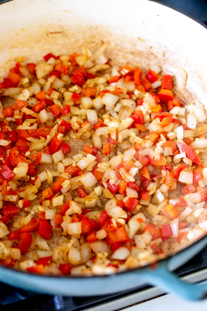 veggies cooking in a large pot.