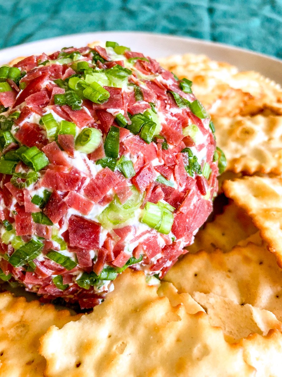 the up close texture on the outside of a dried beef cheese ball.