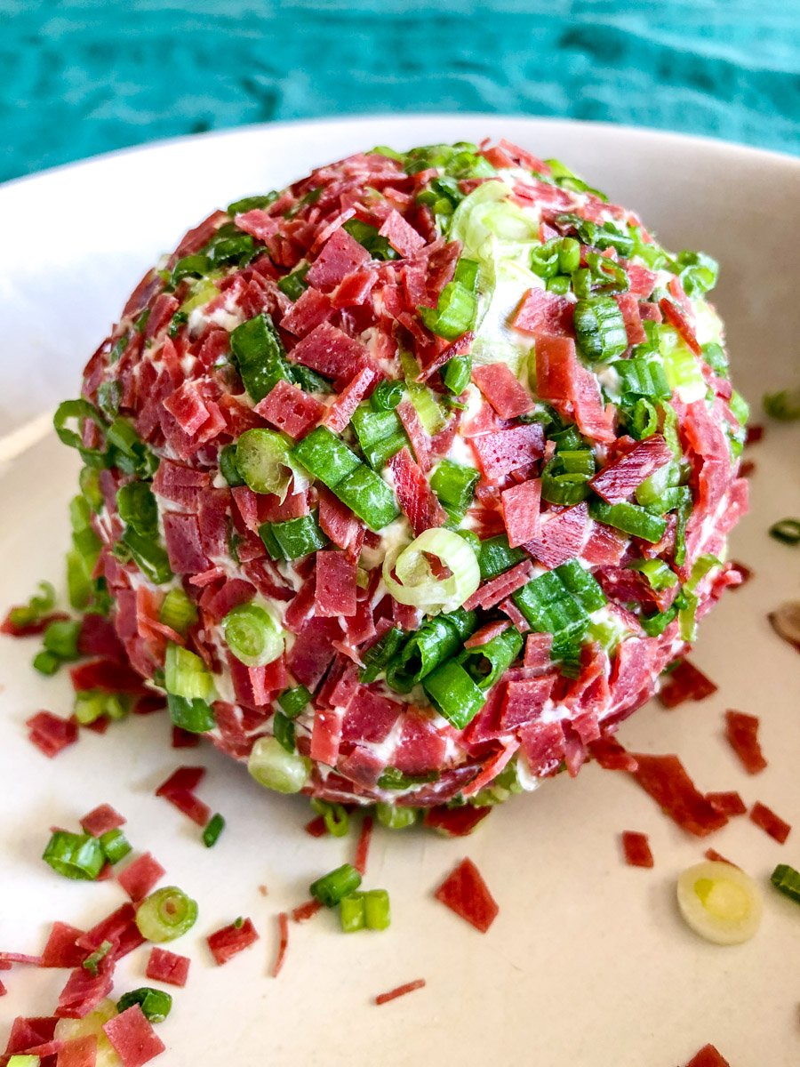 an up close view of the texture of the outside of a dried beef cheese ball.