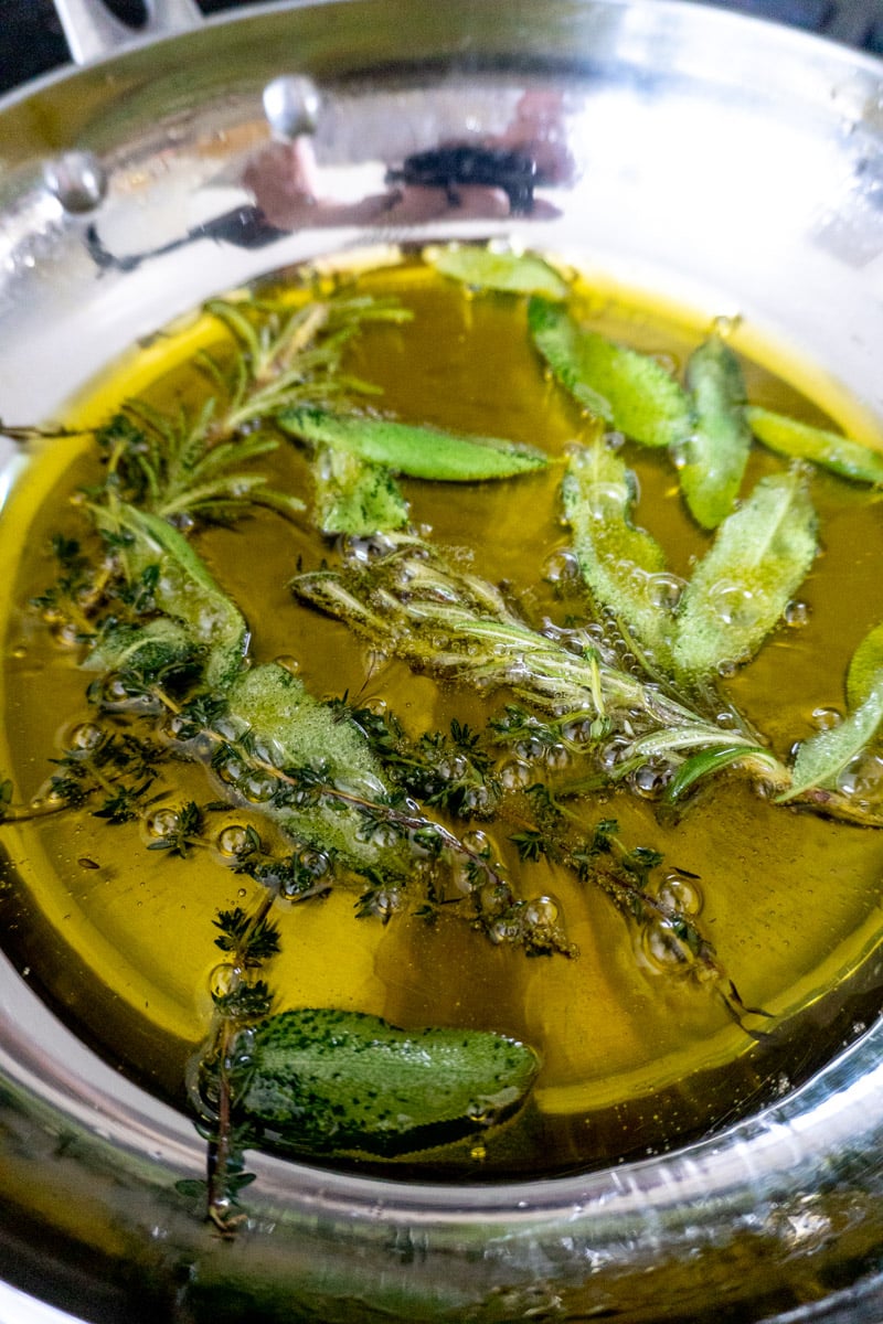 thanksgiving herbs frying in olive oil. 