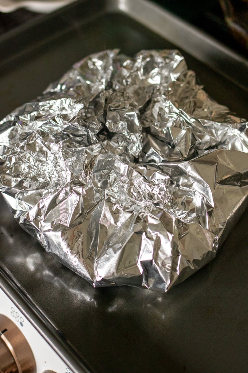 a foil packet full of charred poblano peppers